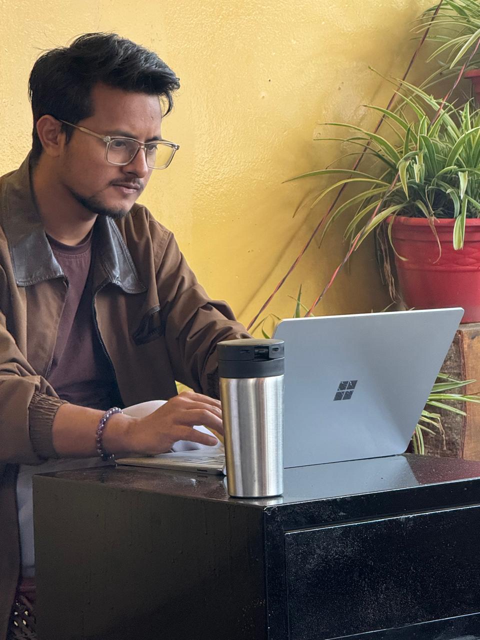 Kamal Khanal, SEO and GEO consultant, working at his desk